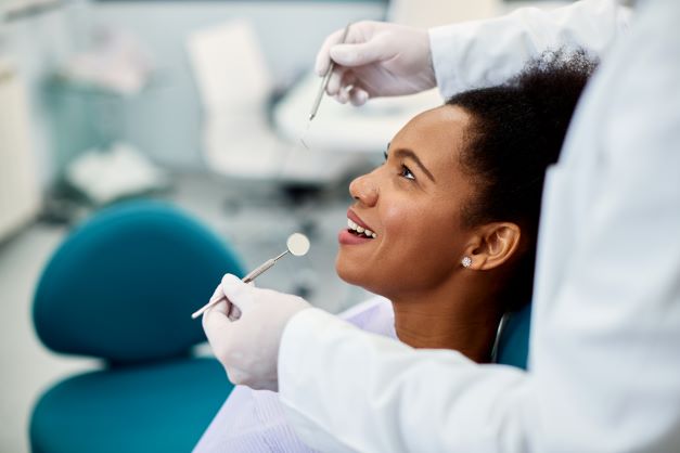 woman getting dental exam